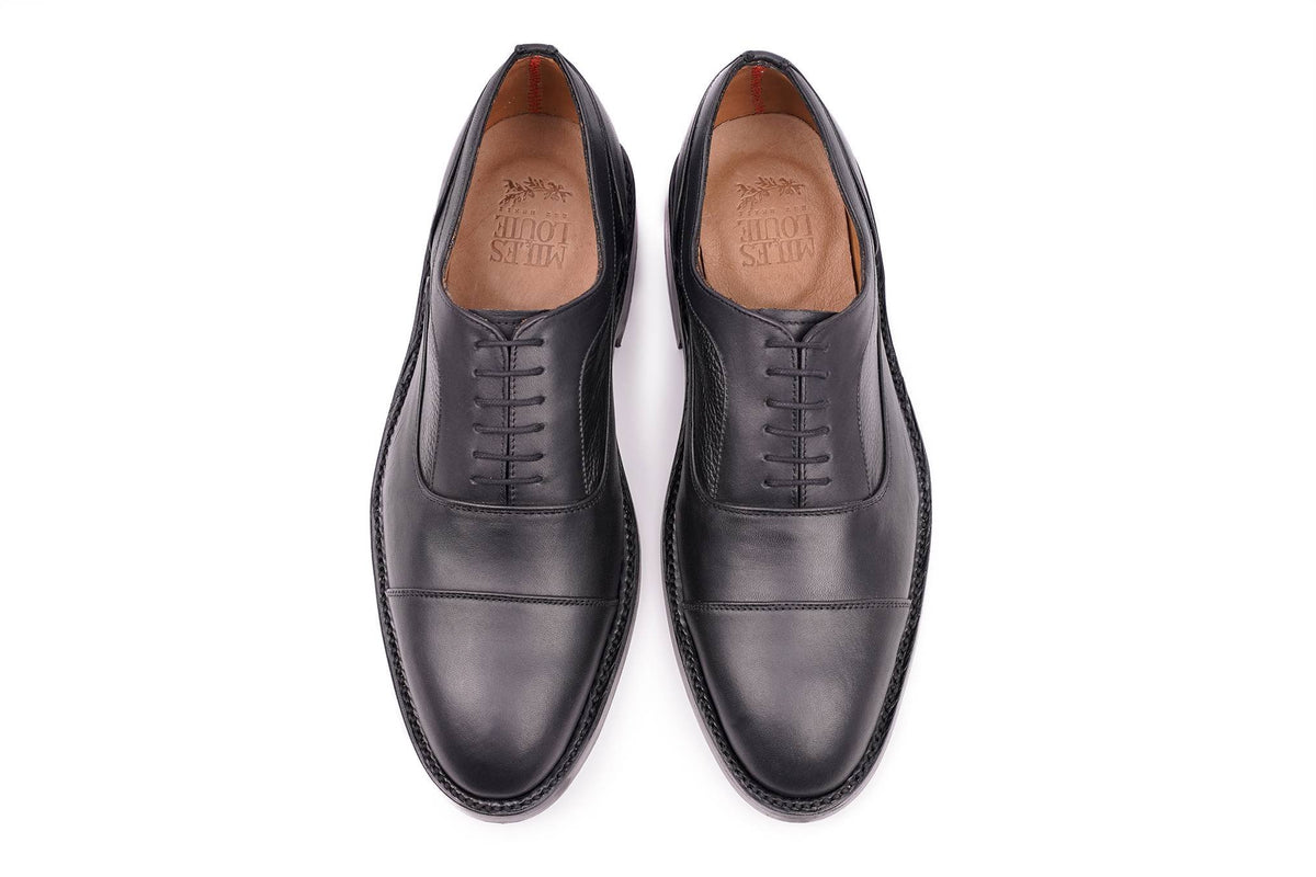 Coleman Captoe de piel color negro — vista lateral (8) — Miles & Louie